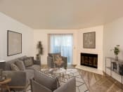 Thumbnail 7 of 21 - Living Room with Fireplace at Chesapeake Commons Apartments