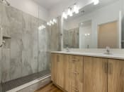 Thumbnail 16 of 24 - Primary Bathroom with Double Vanity and Walk-in Shower at Desert Sage Townhomes, Utah, 84737