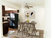 Thumbnail 1 of 34 - Open Concept Kitchen to Dining Area at Crossroads Apartments