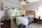 Thumbnail 7 of 30 - Well Decorated Primary Bedroom With Natural Light at Canyon Ridge Apartments, Arizona