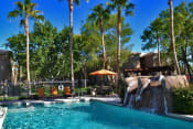 Thumbnail 13 of 30 - Glimmering Pool at Canyon Ridge Apartments, Surprise, AZ