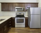 Thumbnail 6 of 39 - Stainless Steel Kitchen Appliances at Four Seasons Apartments & Townhomes, North Logan, Utah