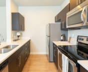 Thumbnail 9 of 38 - Refrigerator And Kitchen Appliances at Parc on Center Apartments & Townhomes, Orem, 84057