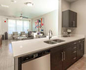 Thumbnail 8 of 38 - Modern Kitchen With Custom Cabinet at Parc on Center Apartments & Townhomes, Utah