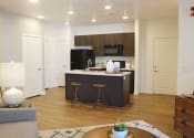 Thumbnail 4 of 32 - Living with Island Kitchen at Veranda Apartments, Draper, UT