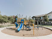 Thumbnail 7 of 61 - Outdoor Playground at Parc at Day Dairy Apartments and Townhomes, Utah