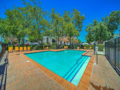 Thumbnail 14 of 21 - Large Swimming Pool at Chesapeake Commons Apartments, California
