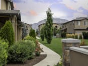 Thumbnail 36 of 39 - Courtyard With Green Space at Four Seasons Apartments & Townhomes, Utah, 84341