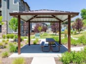 Thumbnail 28 of 38 - Covered Picnic Area at Parc on Center Apartments & Townhomes, Orem, UT