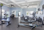 Thumbnail 31 of 46 - Fitness center with cardio machines  |Cypress Legends