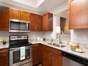 Thumbnail 9 of 14 - Fully Equipped Kitchen at Portofino Cove, Fort Myers, FL, 33916