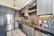 Thumbnail 15 of 23 - Well Equipped Kitchen at Quantum Apartments, Fort Lauderdale, FL