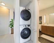 Thumbnail 18 of 23 - Stacked Washer/Dryer at Quantum Apartments, Fort Lauderdale, 33304