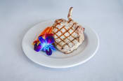 Thumbnail 13 of 55 - a piece of meat on a white plate with flowers