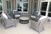 Thumbnail 8 of 16 - Outdoor sitting area at The Viera Senior Living