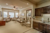 Thumbnail 37 of 45 - Assisted Living living room and kitchen