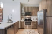 Thumbnail 5 of 48 - Fully Equipped Kitchen at Audere Apartments, Phoenix, AZ