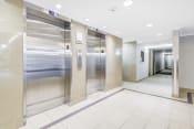 Thumbnail 10 of 16 - a commercial building elevator lobby