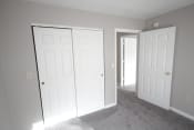 Thumbnail 8 of 11 - Bedroom with two closets and a doorway at Conner Court apartments in Connersville, IN