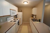 Thumbnail 21 of 75 - This is a photo of the kitchen in the 1040 square foot 2 bedroom Patriot at Washington Place Apartments in Washington Township, OH.