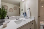 Thumbnail 23 of 37 - This is a photo of the bathroom in a 692 square foot 1 bed, 1 bath model aprtment at Cambridge Court Apartments in Dallas Texas