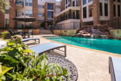 Thumbnail 31 of 37 - This is a photo of the primary pool area at Cambridge Court Apartments in Dallas, TX.