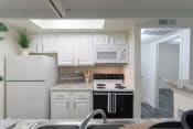 Thumbnail 3 of 37 - This is a photo of the kitchen of the 575 square foot 1 bedroom, 1 bath apartment at Canyon Creek Apartments in Dallas, TX