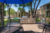 Thumbnail 34 of 37 - This is a photo of BBQ area/patio at Canyon Creek Apartments in Dallas, TX.