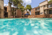 Thumbnail 11 of 37 - This is a photo of the pool area at Canyon Creek Apartments in Dallas, TX.