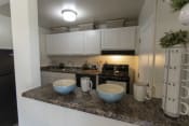Thumbnail 3 of 32 - This is a photo of the kitchen in the 740 square foot 1 bedroom model apartment at Compton Lake Apartments in Mt. Healthy, OH.