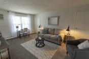 Thumbnail 9 of 32 - This is a photo of the living room in the 740 square foot 1 bedroom model apartment at Compton Lake Apartments in Mt. Healthy, OH.
