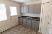 Thumbnail 1 of 38 - This is a photo of the kitchen in the 1004 square foot, 2 bedroom townhome floor plan at Colonial Ridge Apartments in the Pleasant Ridge neighborhood of Cincinnati, OH.