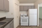 Thumbnail 3 of 38 - This is a photo of the kitchen in the 1004 square foot, 2 bedroom townhome floor plan at Colonial Ridge Apartments in the Pleasant Ridge neighborhood of Cincinnati, OH.