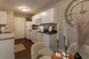 Thumbnail 25 of 75 - This is a photo of the kitchen and dining room of the 890 square foot 2 bedroom, 2 bath Liberty at Washington Place Apartments in in Miamisburg, Ohio in Washington Township.