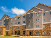 Thumbnail 6 of 15 - Exterior of Logans Landing Apartments in Lynchburg VA