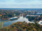 Thumbnail 65 of 71 - an aerial view of a city with a river and treesat Metropolis Apartments, Virginia