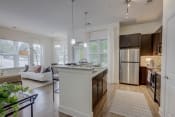 Thumbnail 34 of 51 - Kitchen Island With Pendent Lights at The Lincoln Apartments, Raleigh, NC