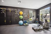 Thumbnail 17 of 58 - a home gym with exercise equipment and a window