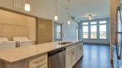 Thumbnail 16 of 53 - Kitchen cabinets and appliances at The View at Blue Ridge Commons Apartments, Roanoke, 24017