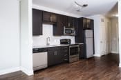Thumbnail 48 of 51 - Fully Furnished Kitchen at The Lincoln Apartments, Raleigh, NC, 27601