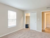 Thumbnail 11 of 38 - Carpeted bedrooms at Colonial Towne Apartments