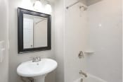 Thumbnail 19 of 24 - bathroom with pedestal sink and marble shower