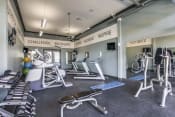 Thumbnail 5 of 18 - Large Fitness Center with Treadmills, Free Weights & Much More  at Overlook at Stone Oak Park Apartments, San Antonio