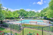 Thumbnail 8 of 13 - Greyson's Gate Apartments in North Dallas, TX offers its residents a sparkling resort-style pool.