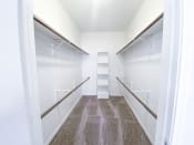 Thumbnail 8 of 22 - Oversized walk in closet at Tuscany Square Apartments in North Dallas, TX. Now leasing studios, 1 and 2 bedroom apartments.