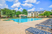 Thumbnail 18 of 22 - Sun deck poolside at Tuscany Square Apartments in North Dallas, TX. Now leasing studios, 1 and 2 bedroom apartments.