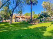 Thumbnail 17 of 22 - Community filled with lush landscaping and mature trees at La Hacienda Apartments in Tucson, AZ!