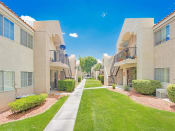 Thumbnail 1 of 41 - Lush walkways of Country Club at Valley View Senior Apartments in Las Vegas, NV, For Rent. Now leasing 1 and 2 bedroom apartments.