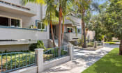 Thumbnail 3 of 6 - Walkway Near Front Entrance of Property at Elmwood Gardens Apartments in Burbank, CA