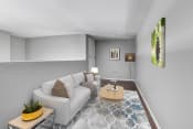 Thumbnail 6 of 33 - a living room with grey walls and a white couch